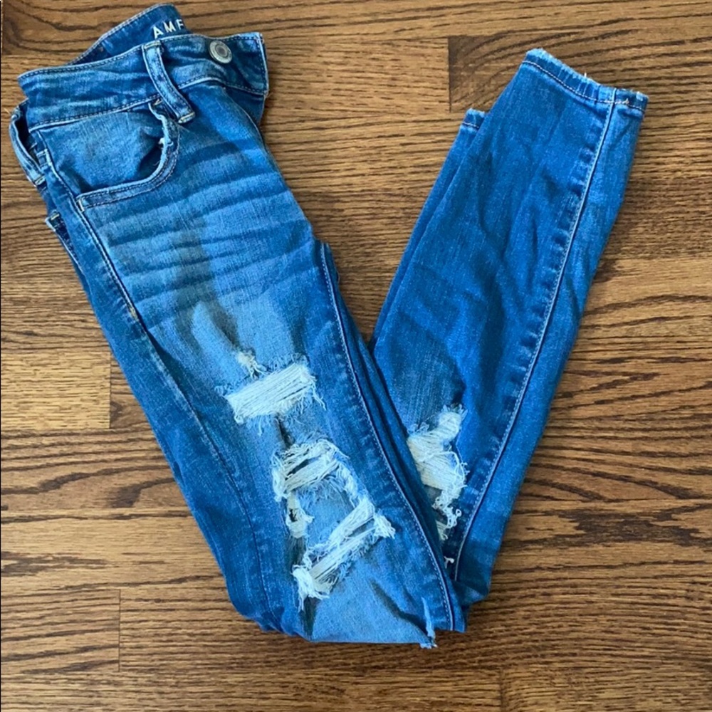 Light wash ripped denim skinny jeans